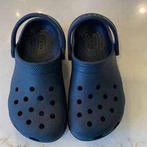 Crocs slip ons.